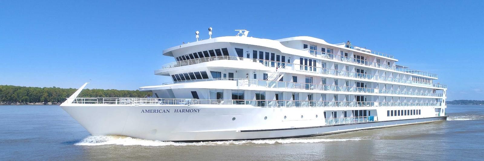 American Harmony riverboat cruising on a river in the USA